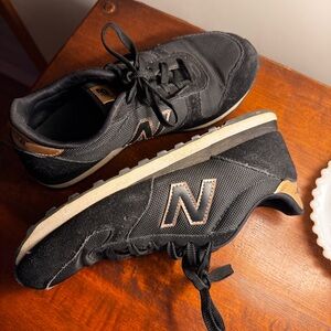 New Balance 311’s Black and Rose Gold